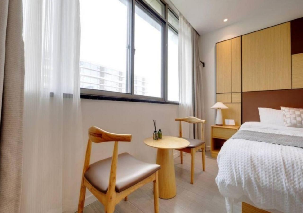 Yueshe - Hongqiao Longbai Xincun Aparthotel